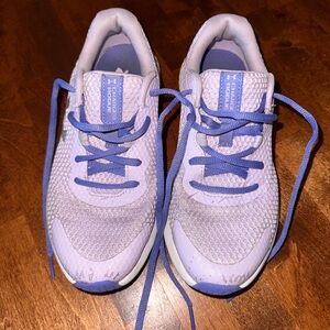 Pair of youth girls size 4.5 Under Armour tennis shoes